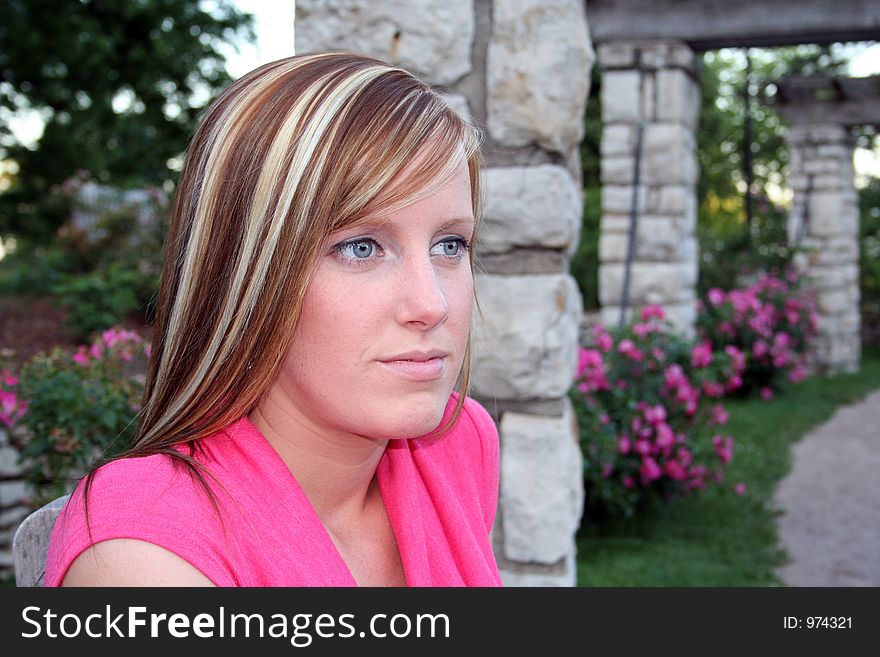 Woman posing in a garden. Woman posing in a garden