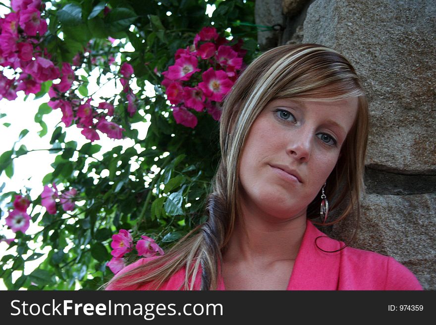 Woman posing in a garden. Woman posing in a garden