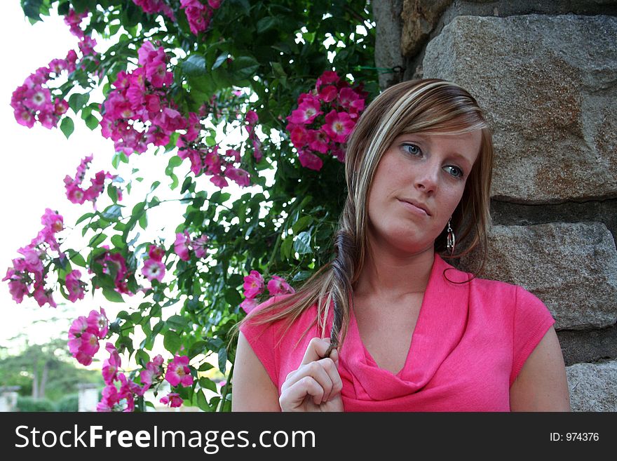 Woman posing in a garden. Woman posing in a garden