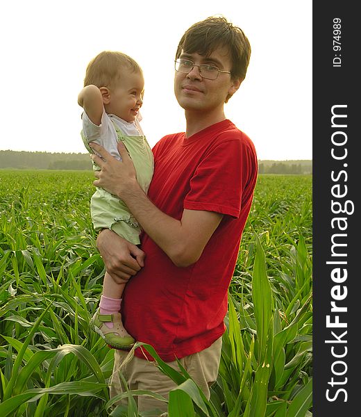 Father with baby in field 2