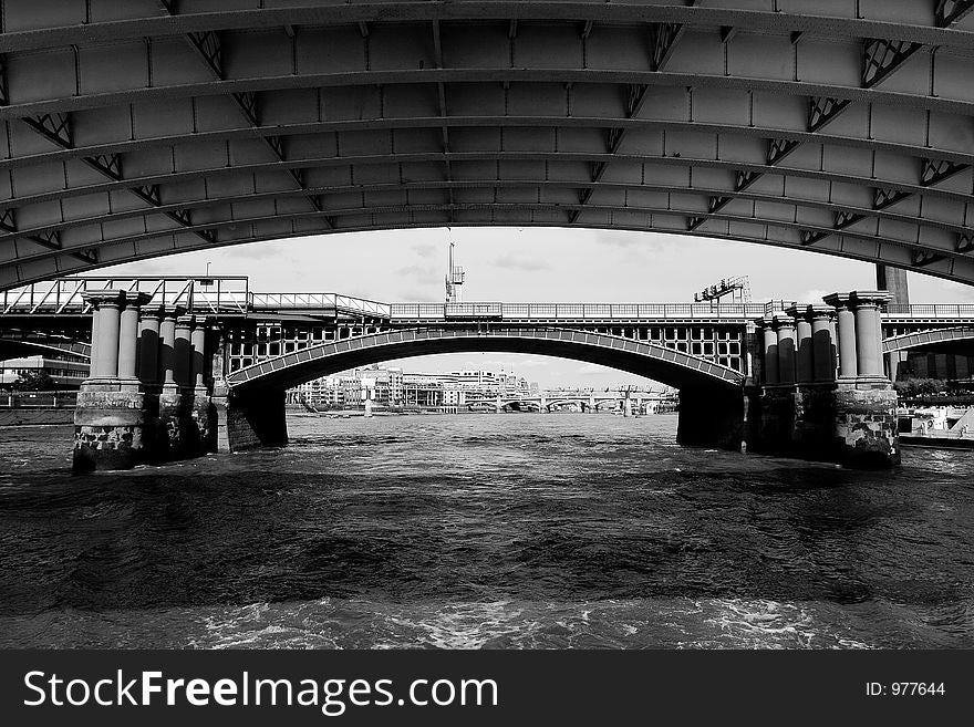 Shot from under the Blackfriars Bridge in London you can see many of the bridges crossing river Thames