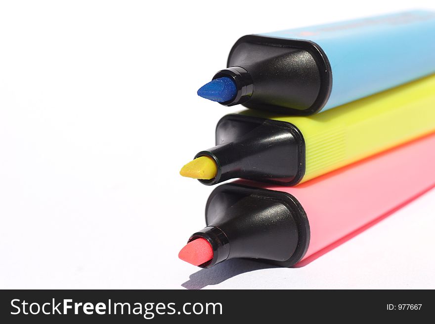 Blue,yellow and pink plastic markers