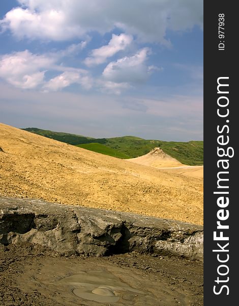 Active volcano mud crater from Mud Volcanoes - Buzau, Romania (unique geological phenomenon in Europe where the earth gas reaches the surface through hills making small Mud volcanoes). Active volcano mud crater from Mud Volcanoes - Buzau, Romania (unique geological phenomenon in Europe where the earth gas reaches the surface through hills making small Mud volcanoes)