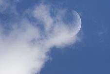 Moon In Day Sky With Clouds Stock Photo
