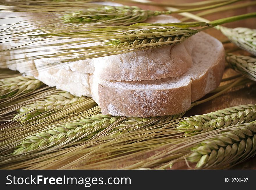 Picture of two slices of bread and wheat ears. Picture of two slices of bread and wheat ears