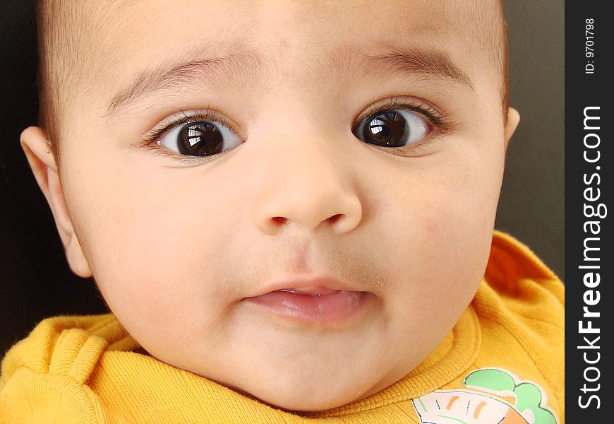 Bright eyed asian baby boy. Bright eyed asian baby boy