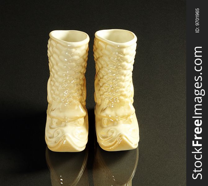 Old-fashioned porcelain Mongolian boots