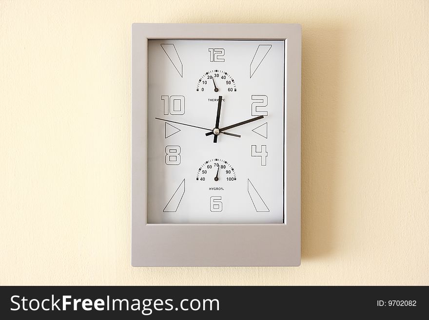 Modern silver wall clock, single object, black hand