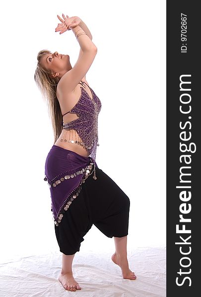 Indian dance. Young woman on white background.