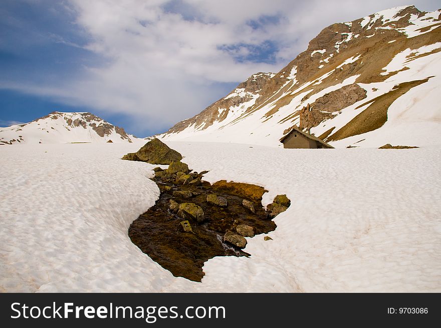 The photo of snowy slopes in the high Alps (Above 2000 m). The photo of snowy slopes in the high Alps (Above 2000 m).