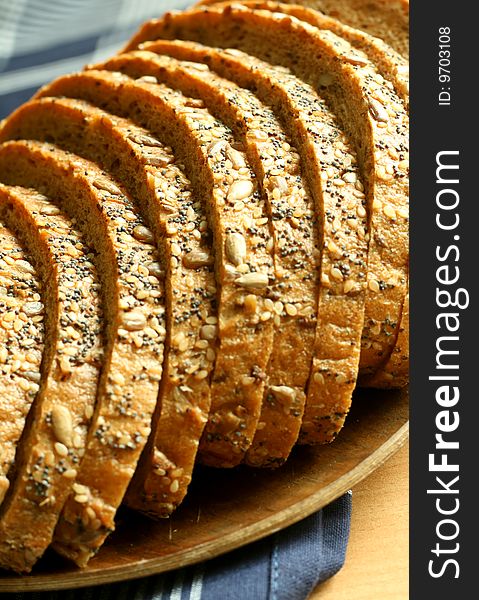 baked bread with sunflower seeds on plate