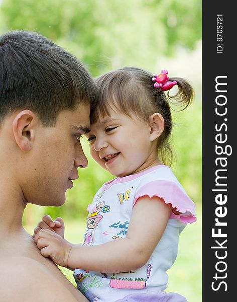 Happy Father And Daughter Outdoor Fun In Summer