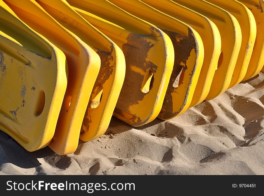 Yellow sunbeds on the beach