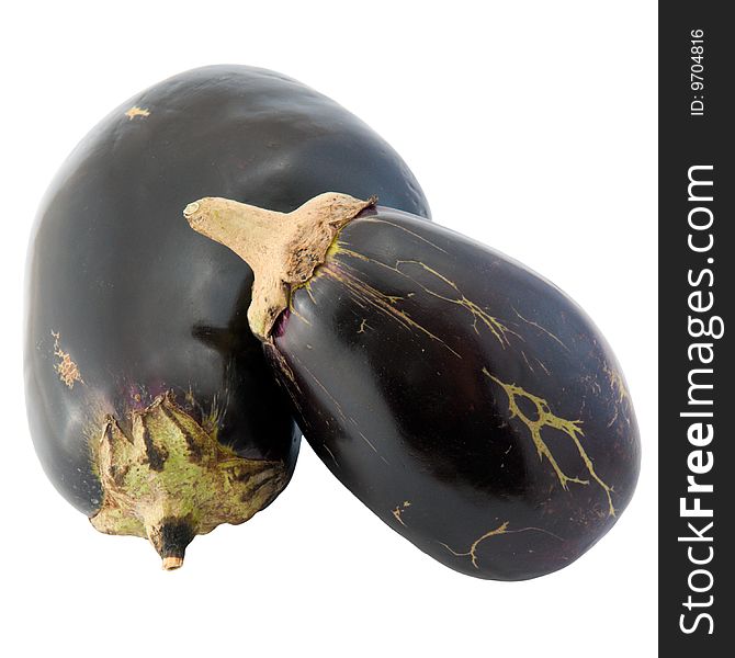 Still life of a large and small eggplant with natural patterns on their skin, isolated on white background, with clipping path. Still life of a large and small eggplant with natural patterns on their skin, isolated on white background, with clipping path.