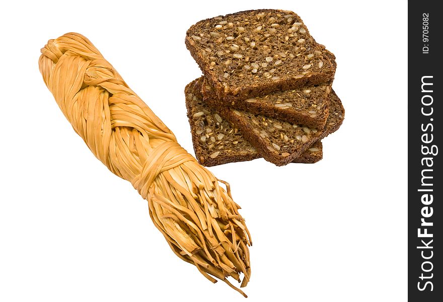 The braided cheese and bread with sunflower seeds of a rough grinding