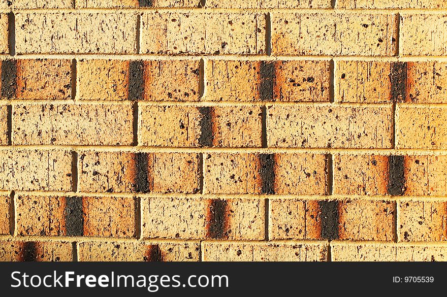 Brick wall showing colours and patterns of building bricks