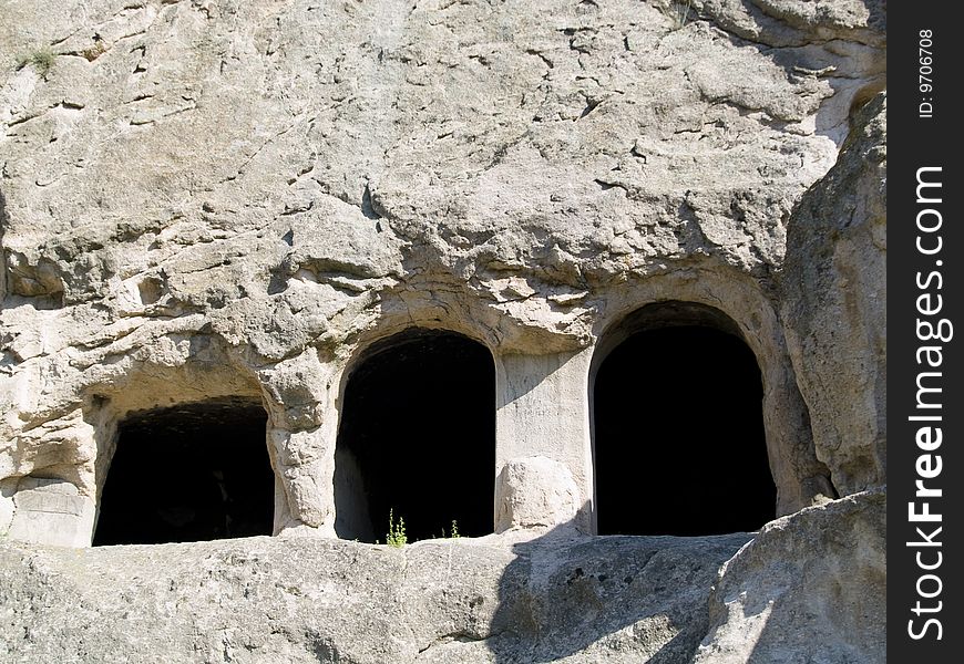 Three doors in Vardzia stones city in Georgia. Caucasus