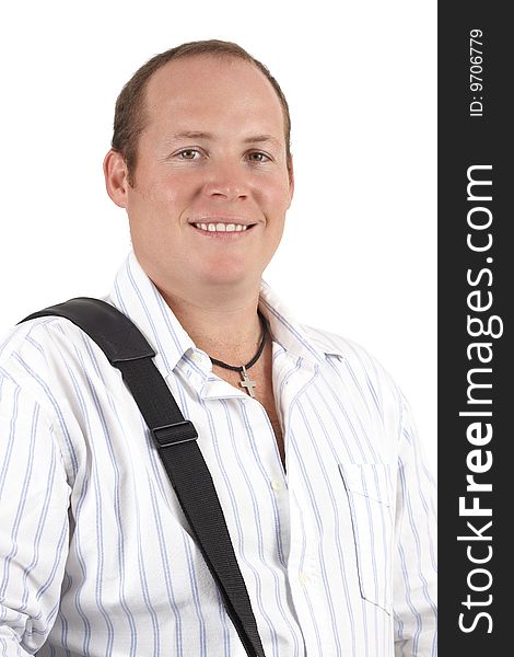 Young successful businessman wearing striped shirt with a laptop bag strap over his shoulder. Isolated on white background. Young successful businessman wearing striped shirt with a laptop bag strap over his shoulder. Isolated on white background