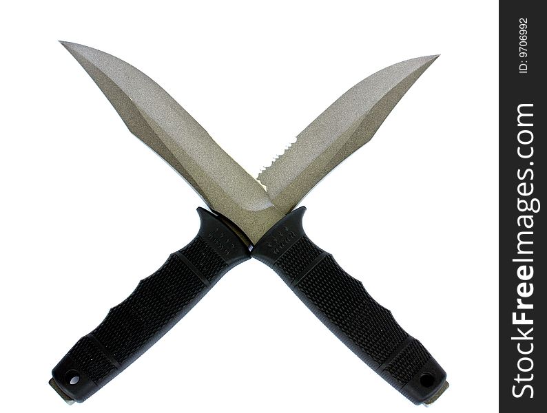 Combat knife`s crossed on the white background closeup. Combat knife`s crossed on the white background closeup