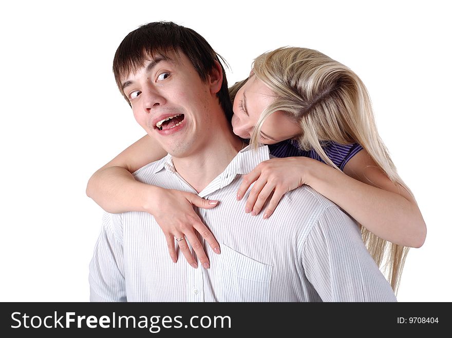 Young loving couple isolated at white background