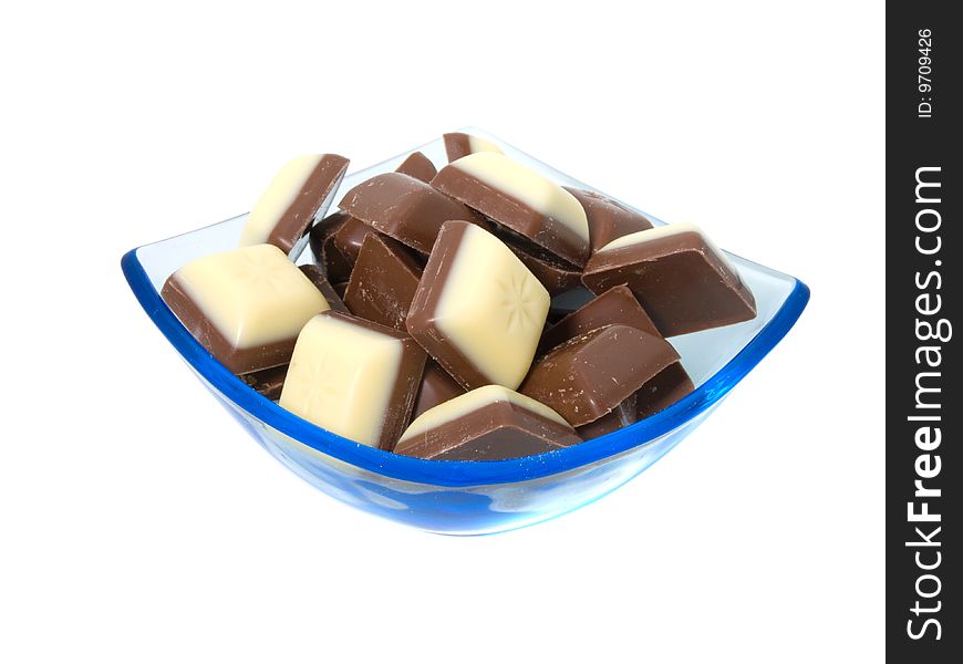 Chocolate sweets against white background.
