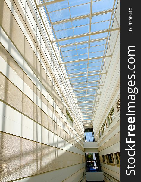 Glass roof and wall in modern music conservatory. Glass roof and wall in modern music conservatory