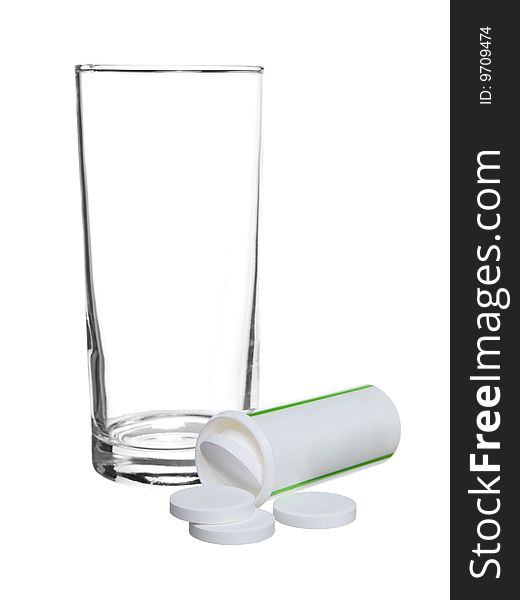 Empty glass withe tablets aspirin isolated on a white background.