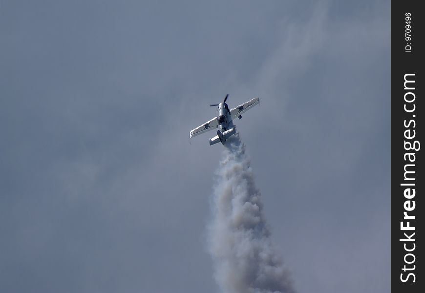 Plane performing midair tricks. Airshow Goraszka, Poland (June 2009)