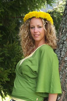 Curly Girl With Dandelion Chain On Head Stock Image