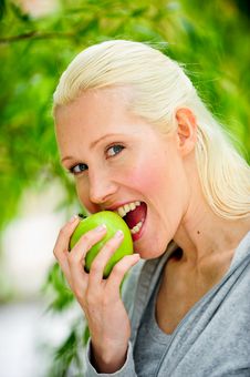 Beautiful Blond Female Relaxing In The Park Royalty Free Stock Photography Beautiful Blond Female Relaxing In The Park Royalty Free Stock Photography