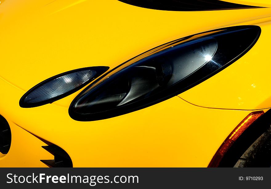 Yellow modern sports car details. Yellow modern sports car details