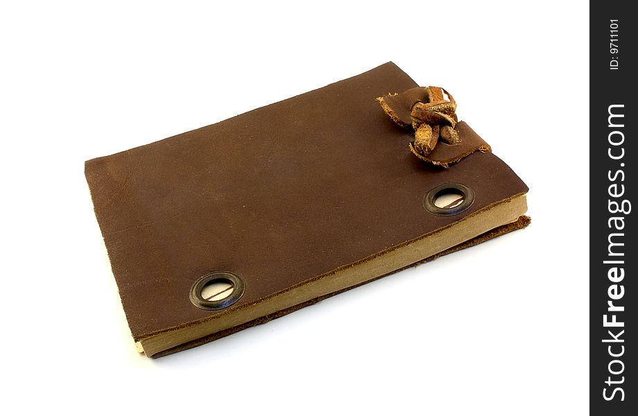 Old leather notepad isolated on white