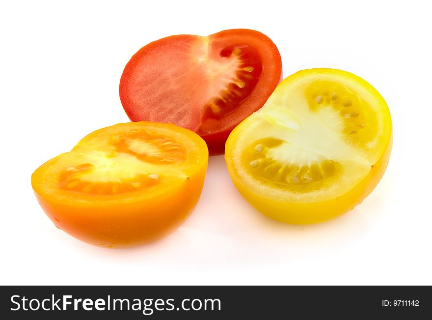 Yellow, red and orange cherry tomatoes. Yellow, red and orange cherry tomatoes
