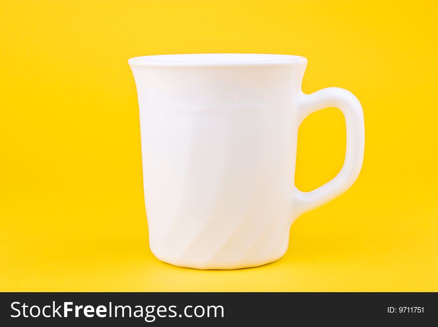 Your morning breakfast mug. Isolated on yellow