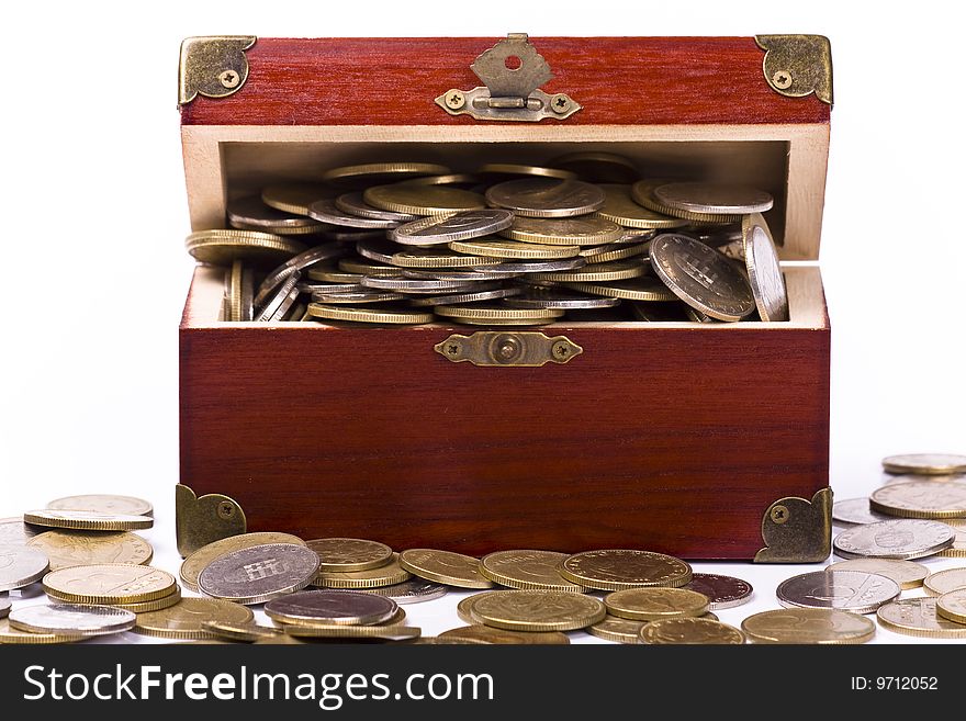 Wooden chest with coins inside isolated. Wooden chest with coins inside isolated