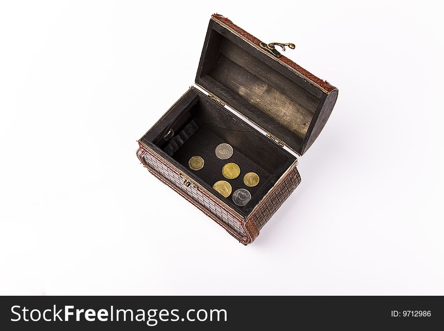 Wooden chest with coins inside isolated. Wooden chest with coins inside isolated