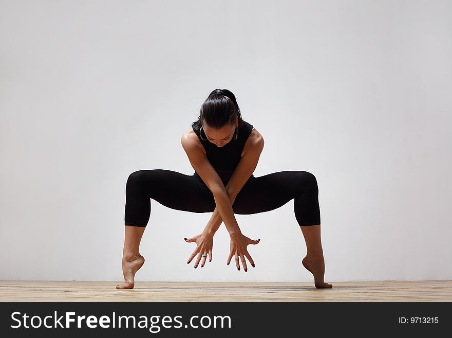 Modern style dancer posing on studio background. Modern style dancer posing on studio background