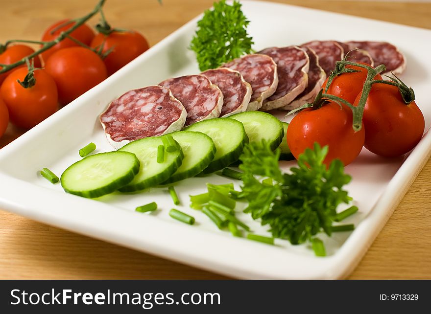 French salami with vegetables and herbs