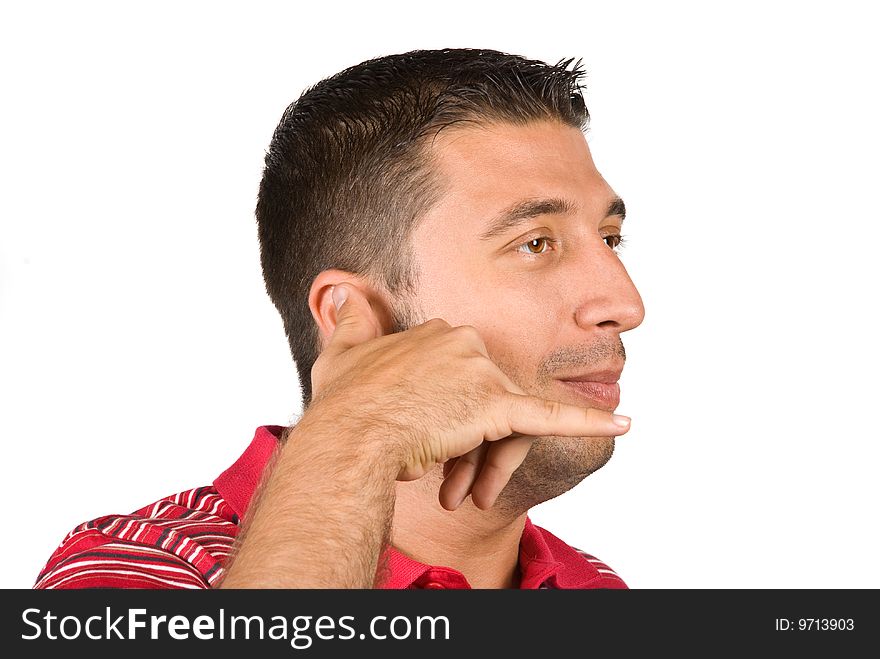 Young man in profile side gesturing with his hand a phone call and smiling isolated on white background.Same series with this model in Facial expressions and gesture. Young man in profile side gesturing with his hand a phone call and smiling isolated on white background.Same series with this model in Facial expressions and gesture