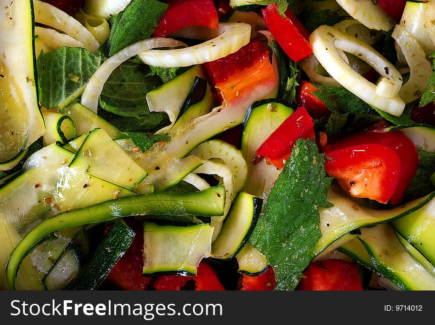 Salad from fresh vegetable with olive oil, detail, close up