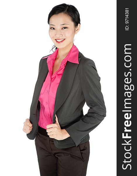 An attractive businesswoman posing in a studio