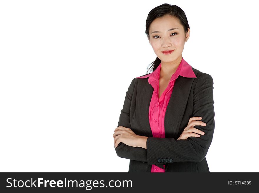 An attractive businesswoman posing in a studio
