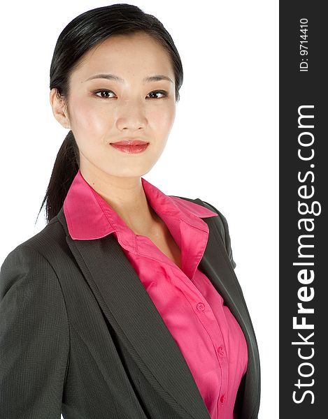 An attractive businesswoman posing in a studio