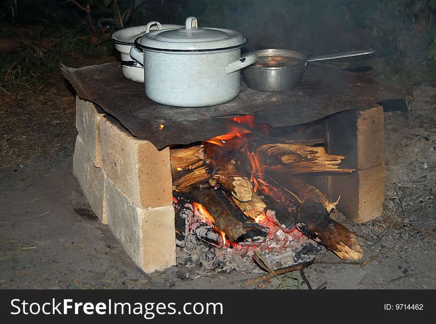 Preparation of soup on a fire