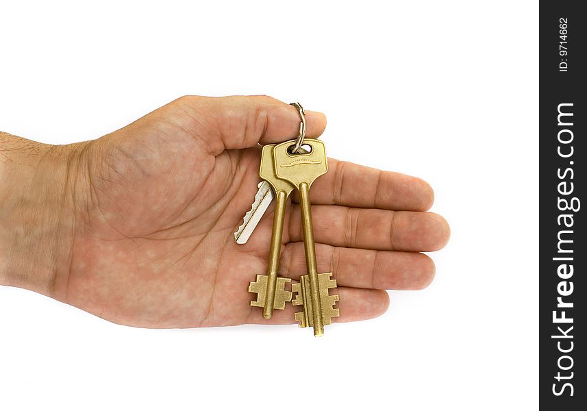 Hand with keys on a white background