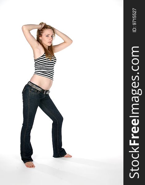 Woman in low jeans showing her bare belly