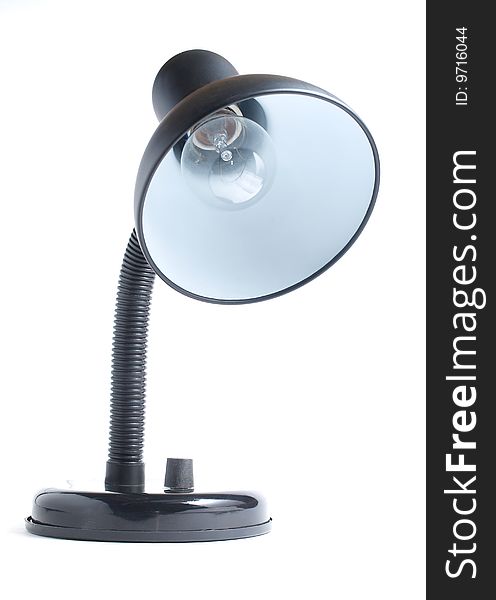 Color photo of the desk lamp. An isolated object on a white background. Color photo of the desk lamp. An isolated object on a white background