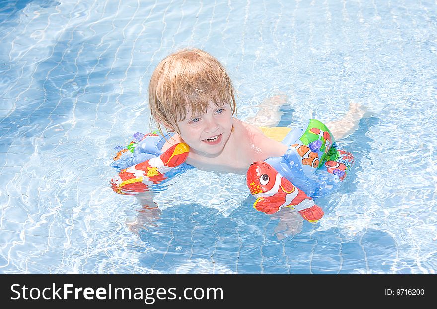 Little girl in the  pool