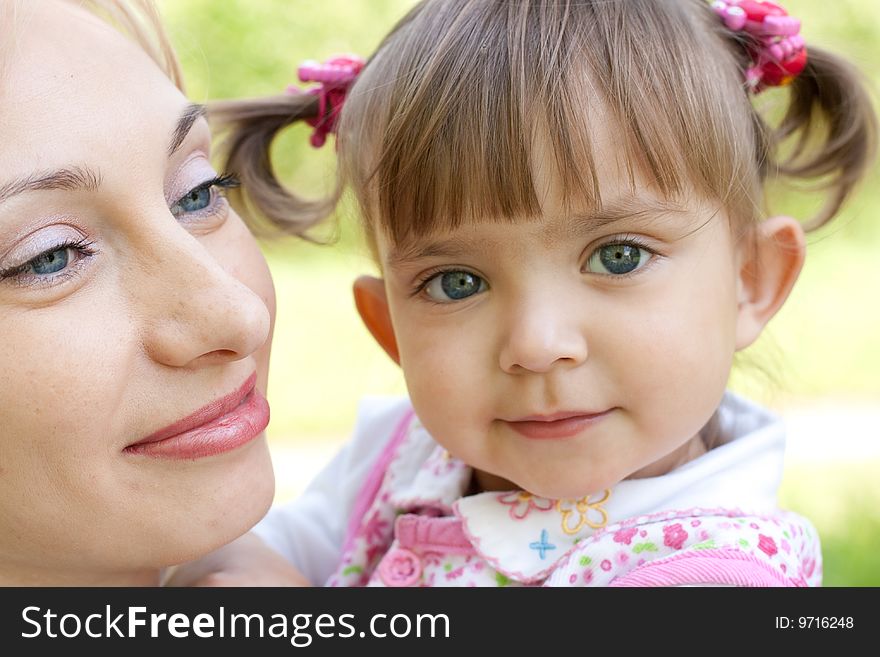 Happy Mother And Daughter Closeup Outdoor