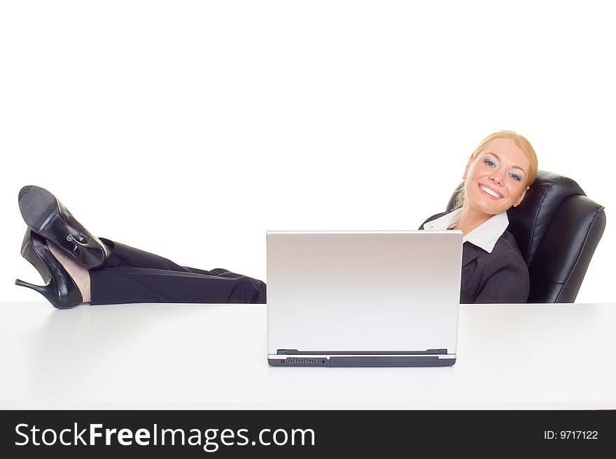 Businesswoman relaxing with lags on table
